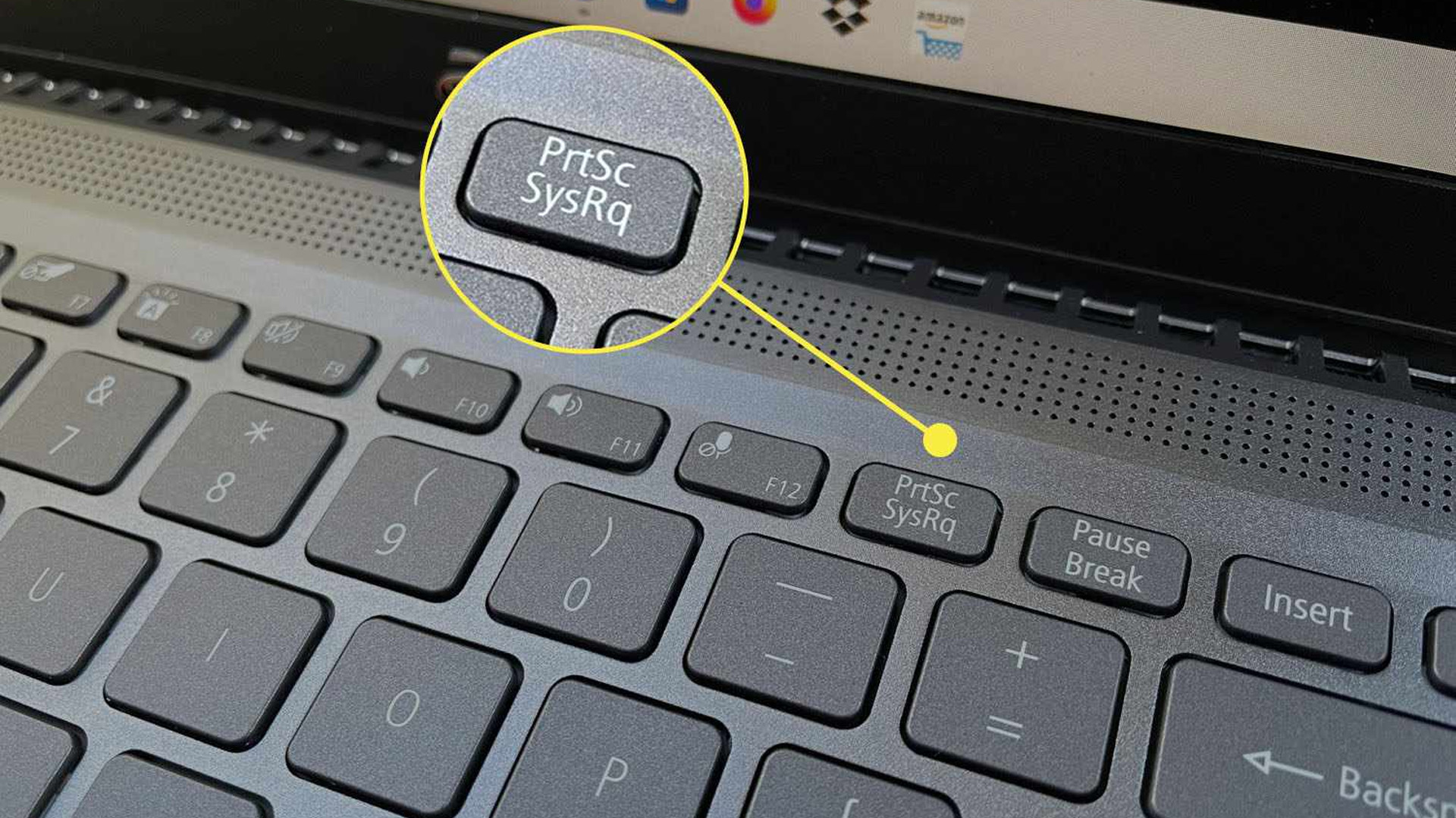 Close-up of an Acer laptop keyboard highlighting the PrtSc SysRq screenshot key.