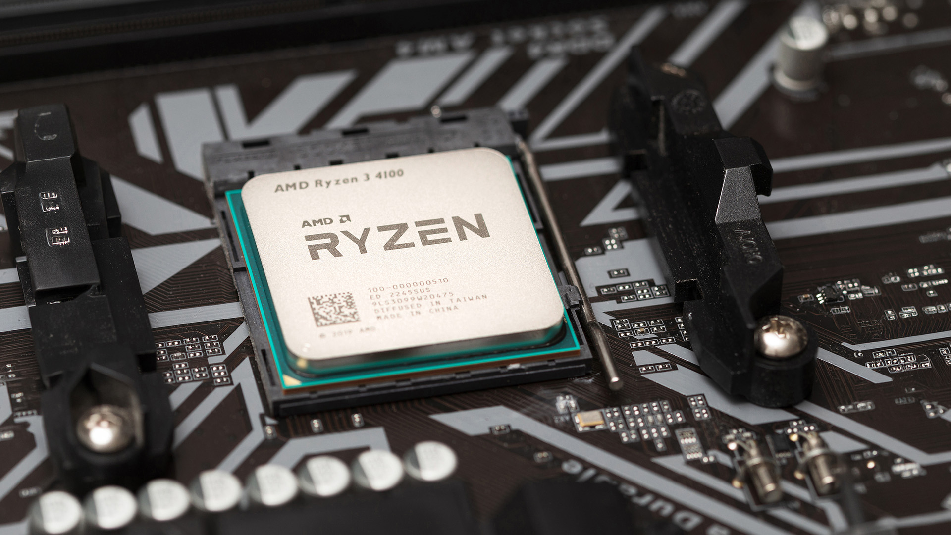 An AMD Ryzen processor installed on a computer motherboard socket.