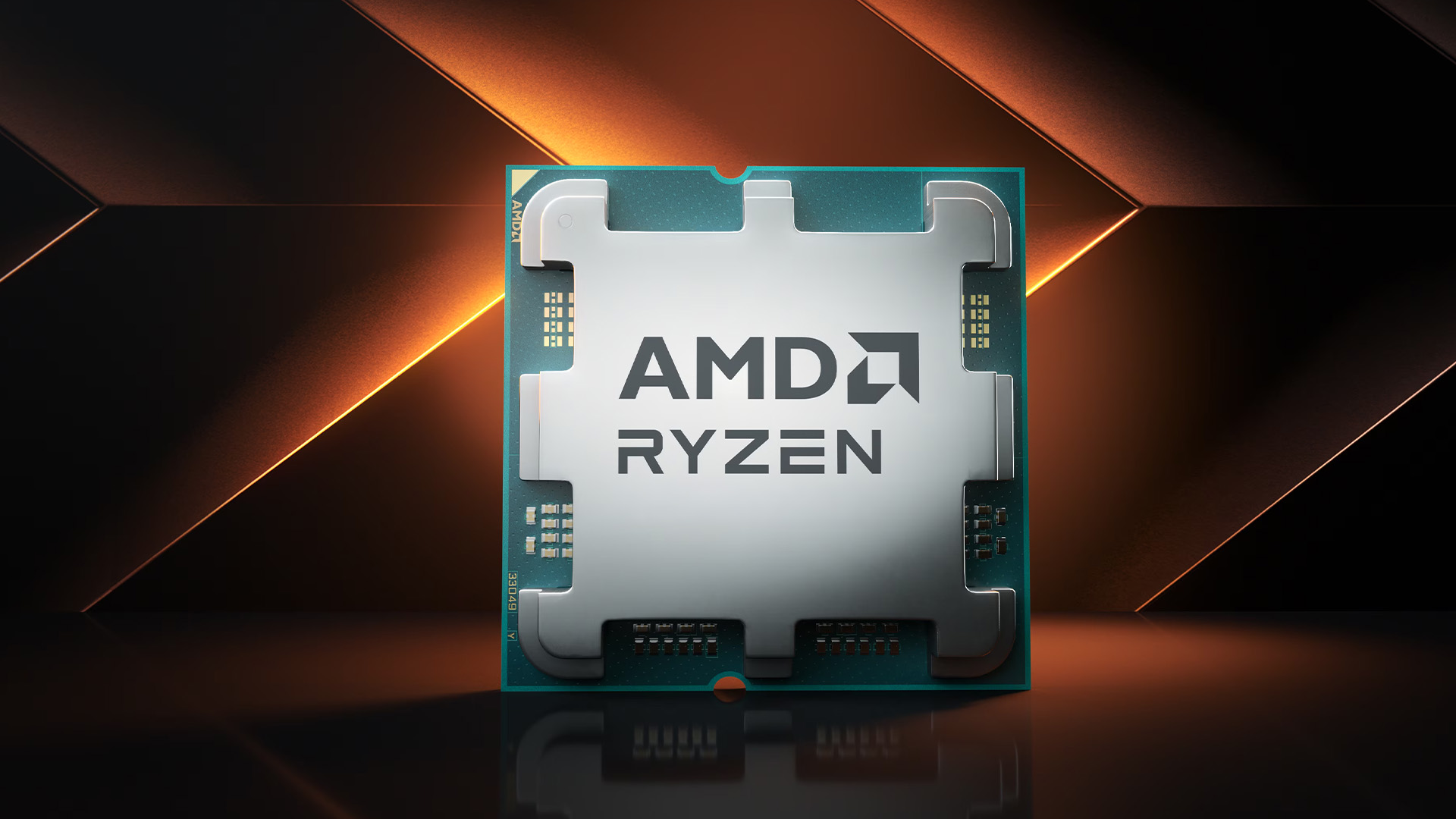 Close-up view of an AMD Ryzen desktop CPU processor on a dark surface.