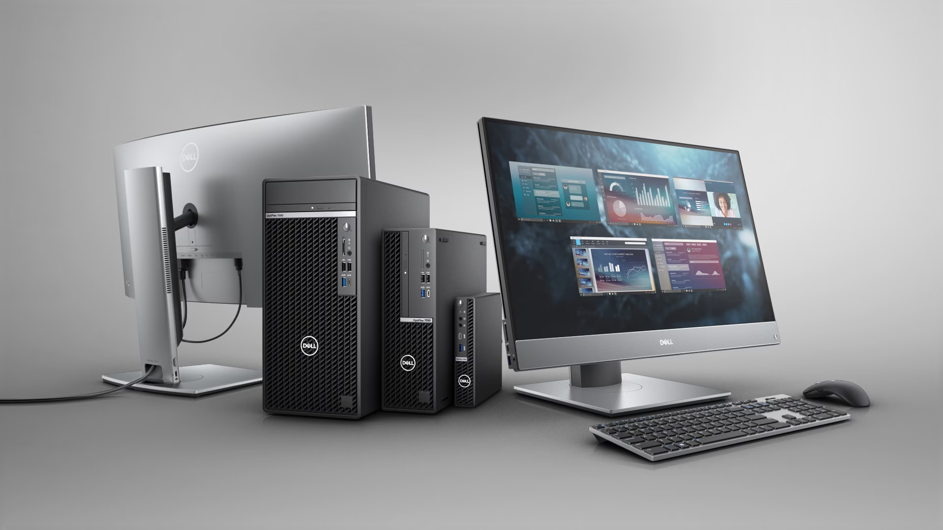 A lineup of Dell OptiPlex business desktops showing tower, micro, and all-in-one form factors.