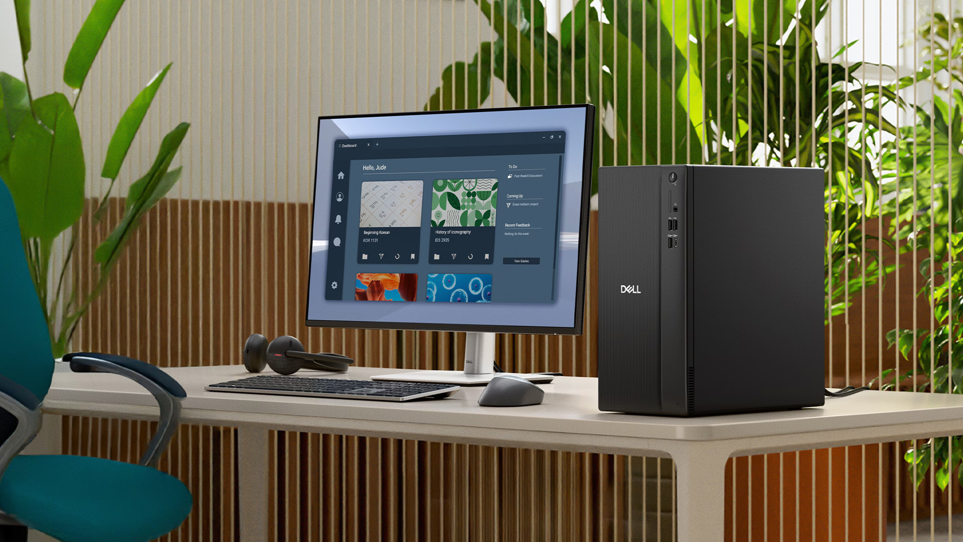 A Dell Pro Slim desktop computer setup on a modern office desk with plants.