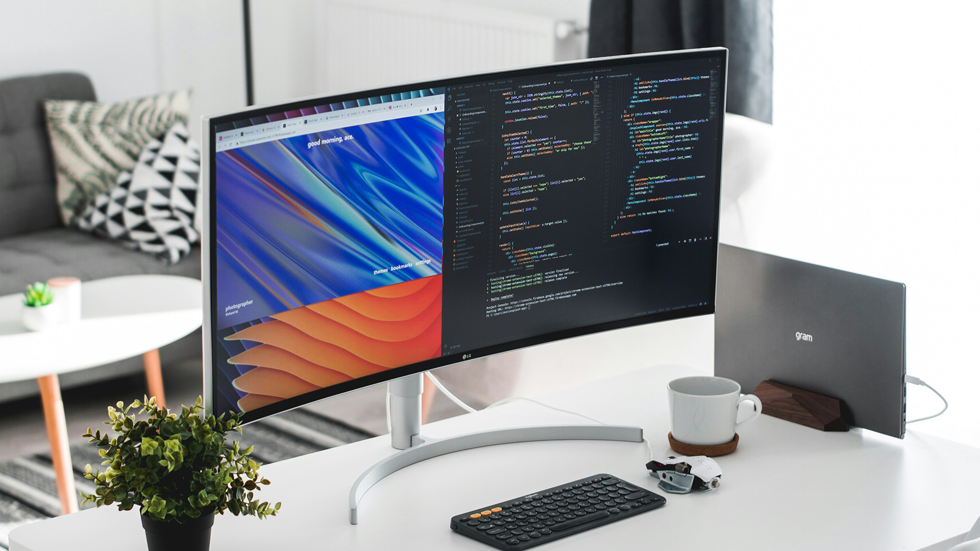 A curved ultrawide monitor displaying code and browser windows on a clean desk.