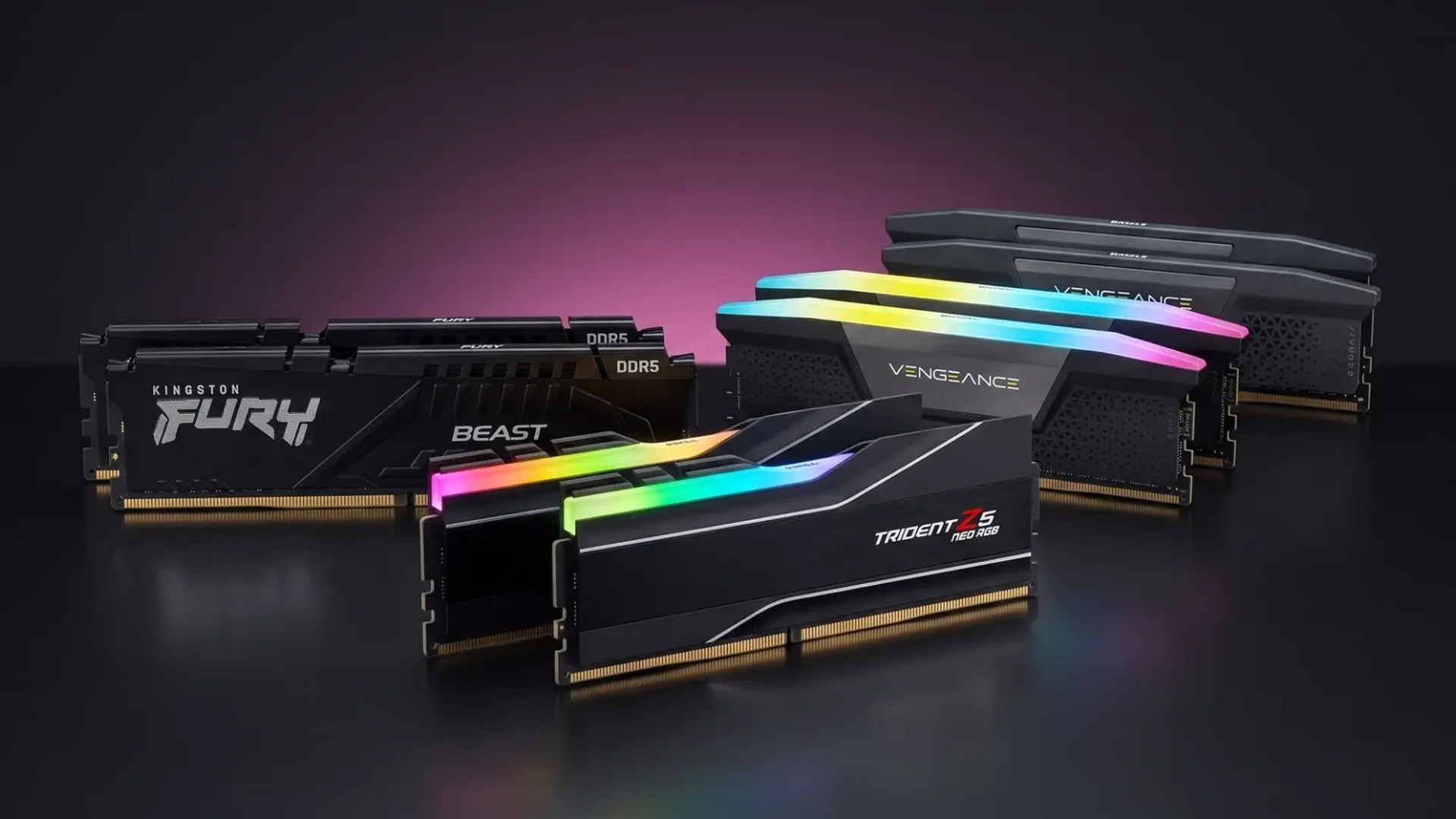 Several DDR5 gaming RAM modules from different brands arranged on a dark surface.