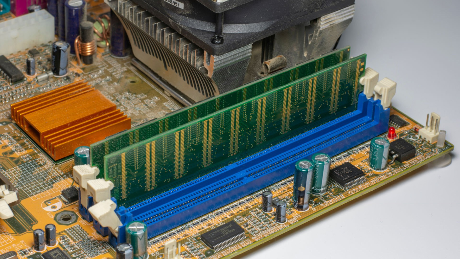 Two green RAM modules installed side-by-side in motherboard slots for dual-channel operation.