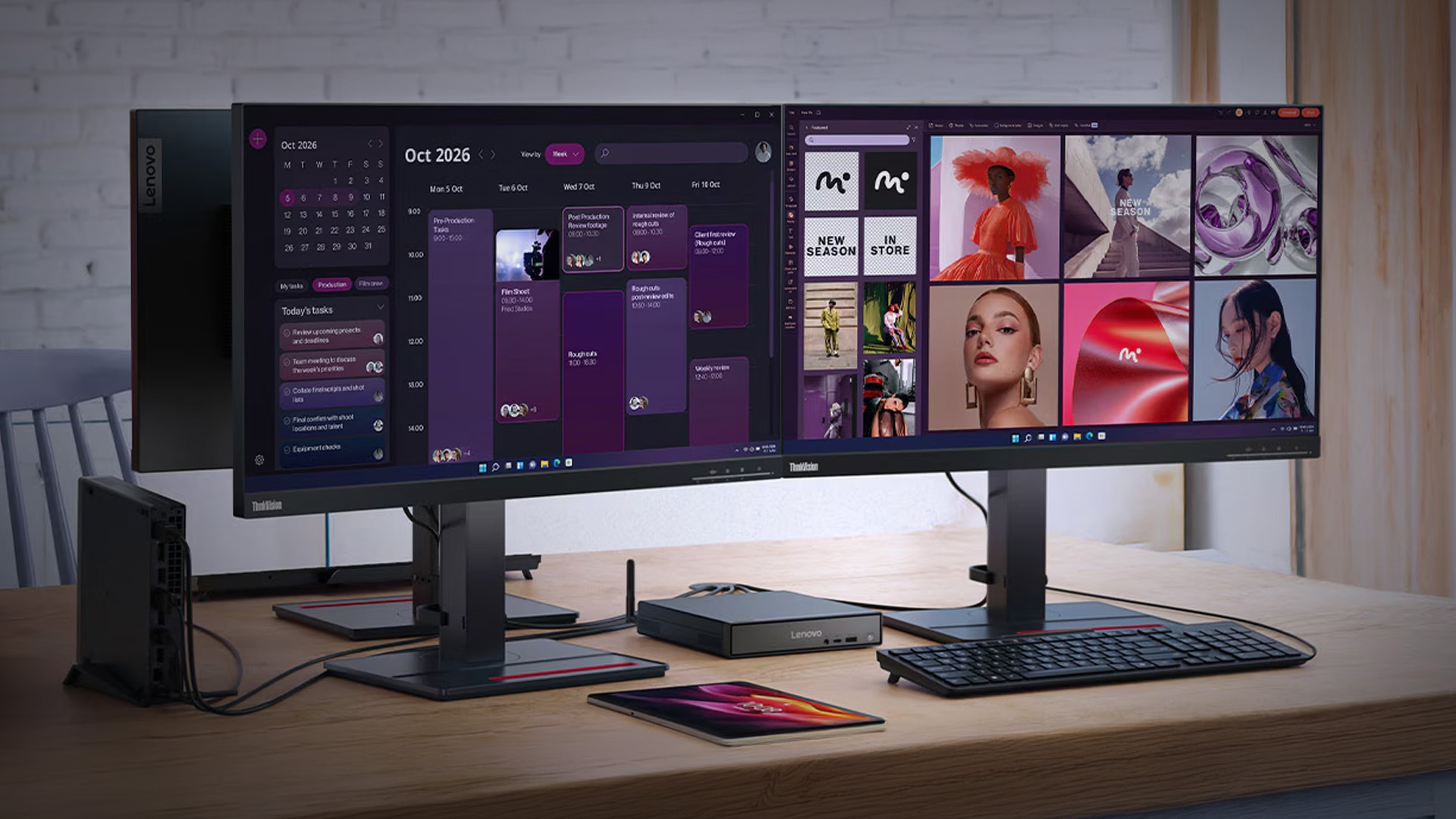 A dual Lenovo ThinkVision monitor workstation setup displaying calendar schedules and media content.