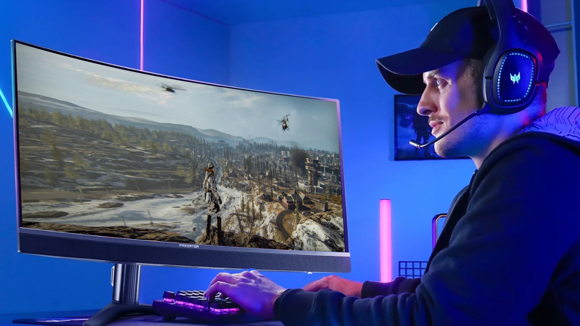 Gamer wearing headphones playing Call of Duty Warzone on a curved monitor.