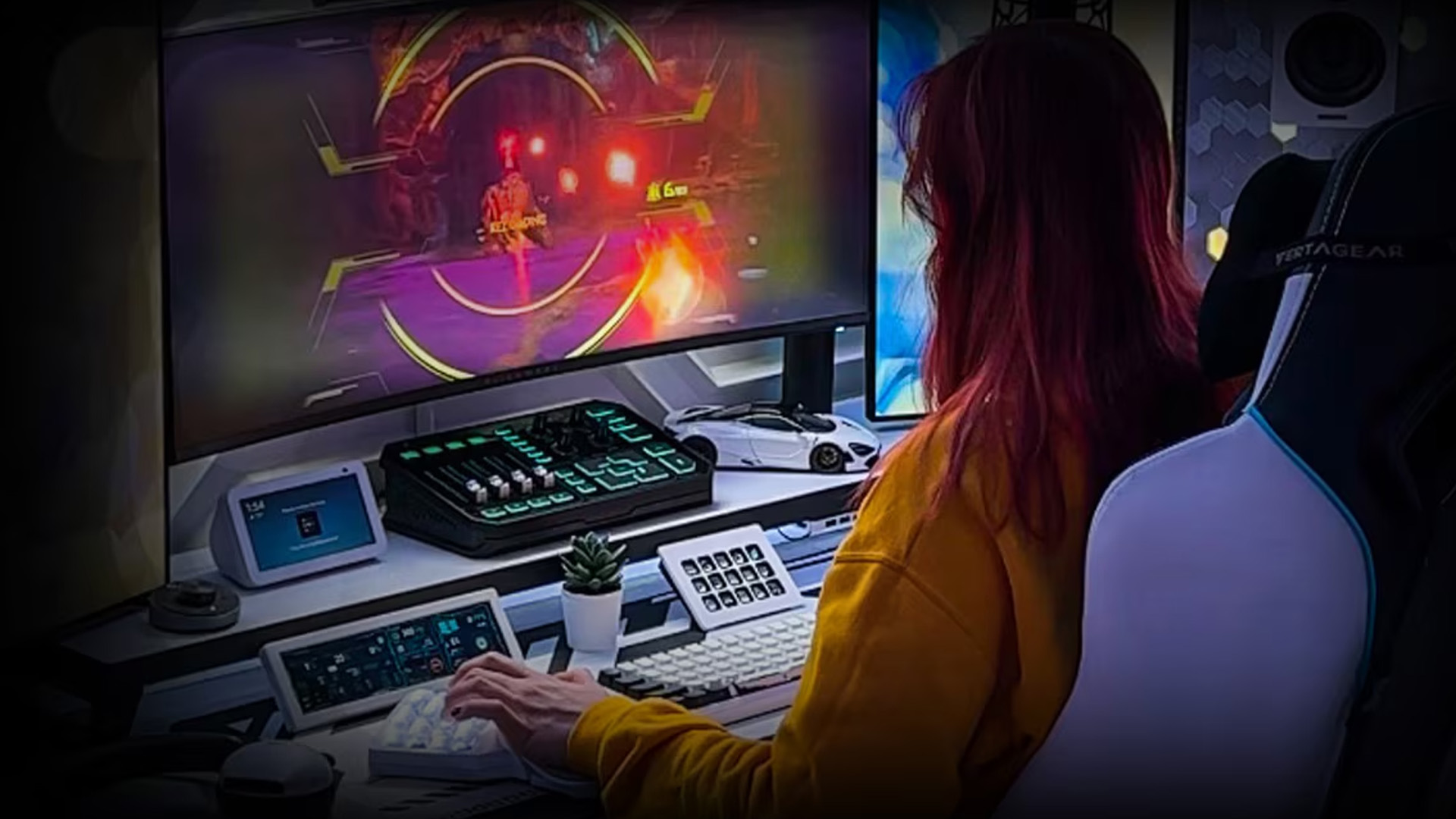 Gamer with red hair streaming gameplay on a multi-monitor gaming desk setup.