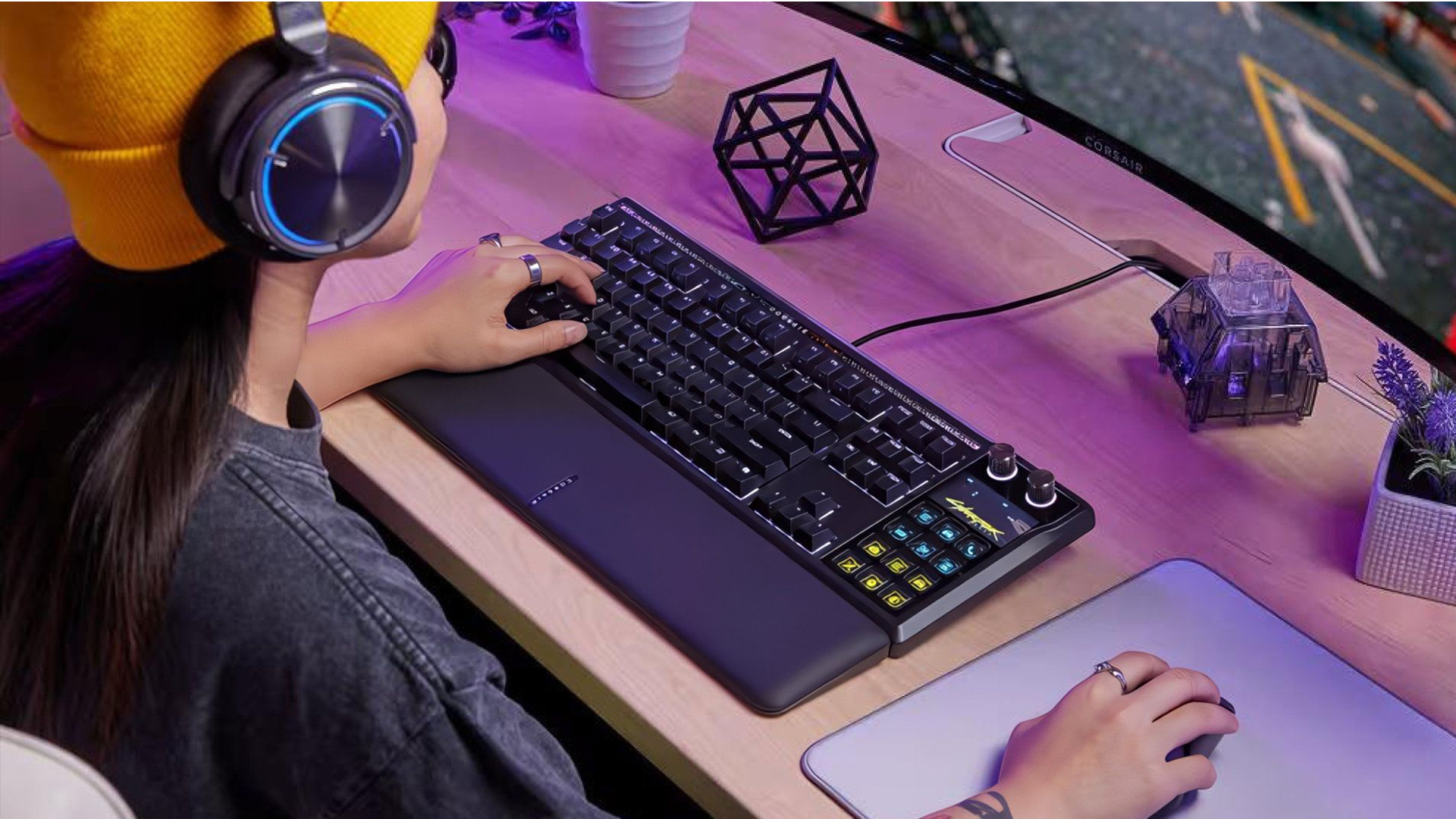 Modern gaming setup with an ultrawide monitor and powerful PC tower.