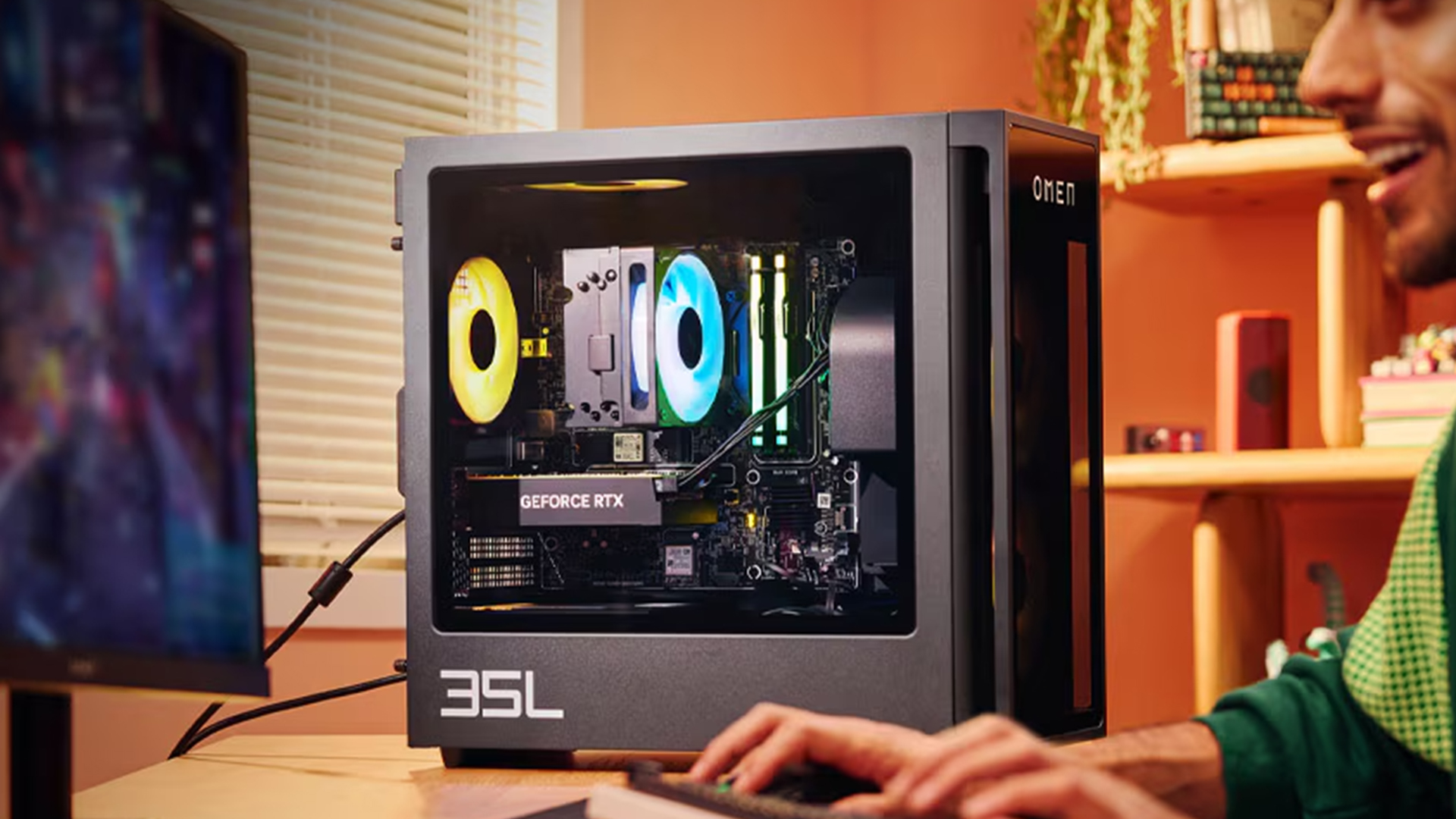 A gamer using an HP OMEN 35L desktop PC with vibrant internal RGB lighting.