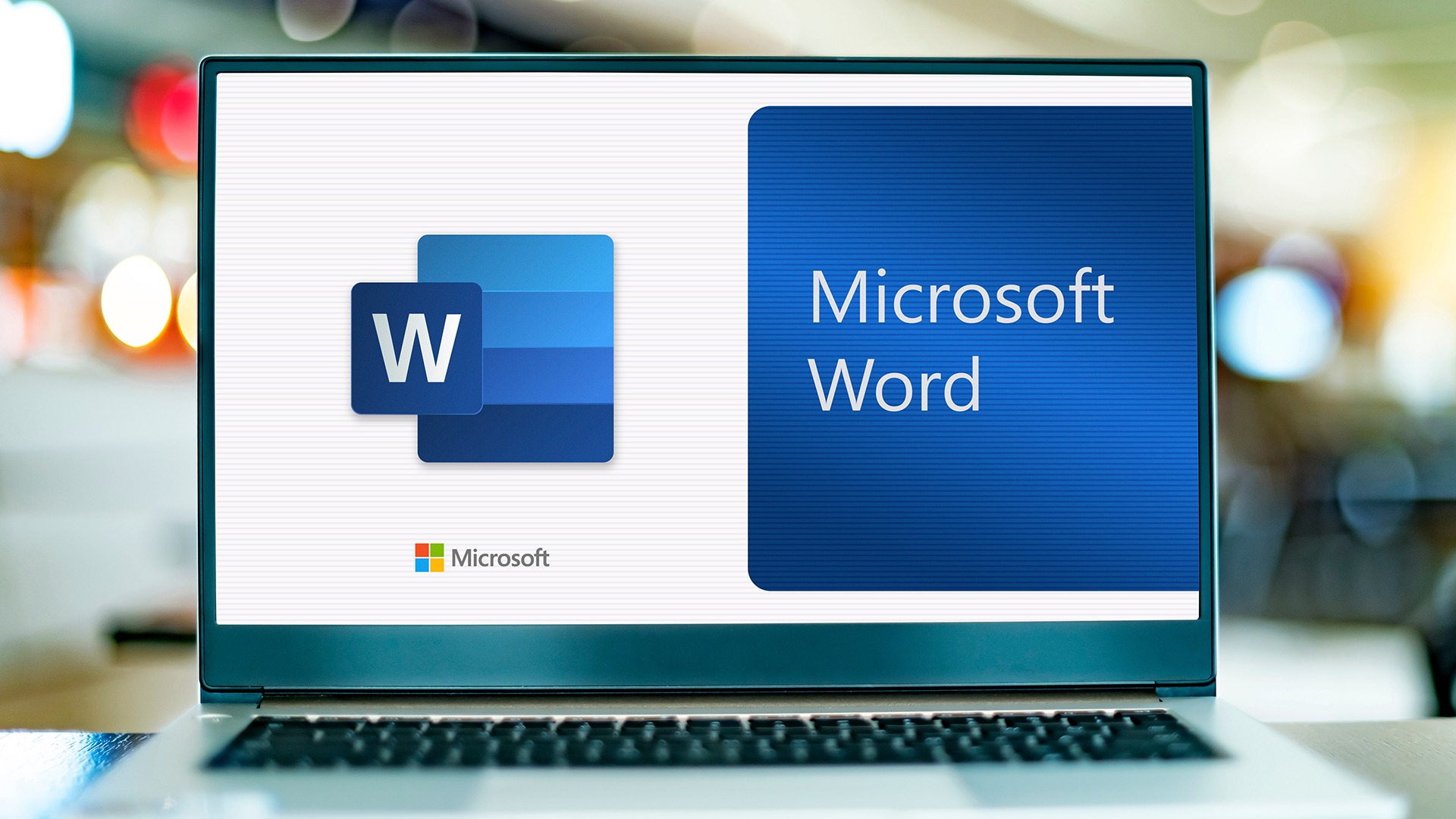 A laptop screen displaying the Microsoft Word application logo and program launch screen.