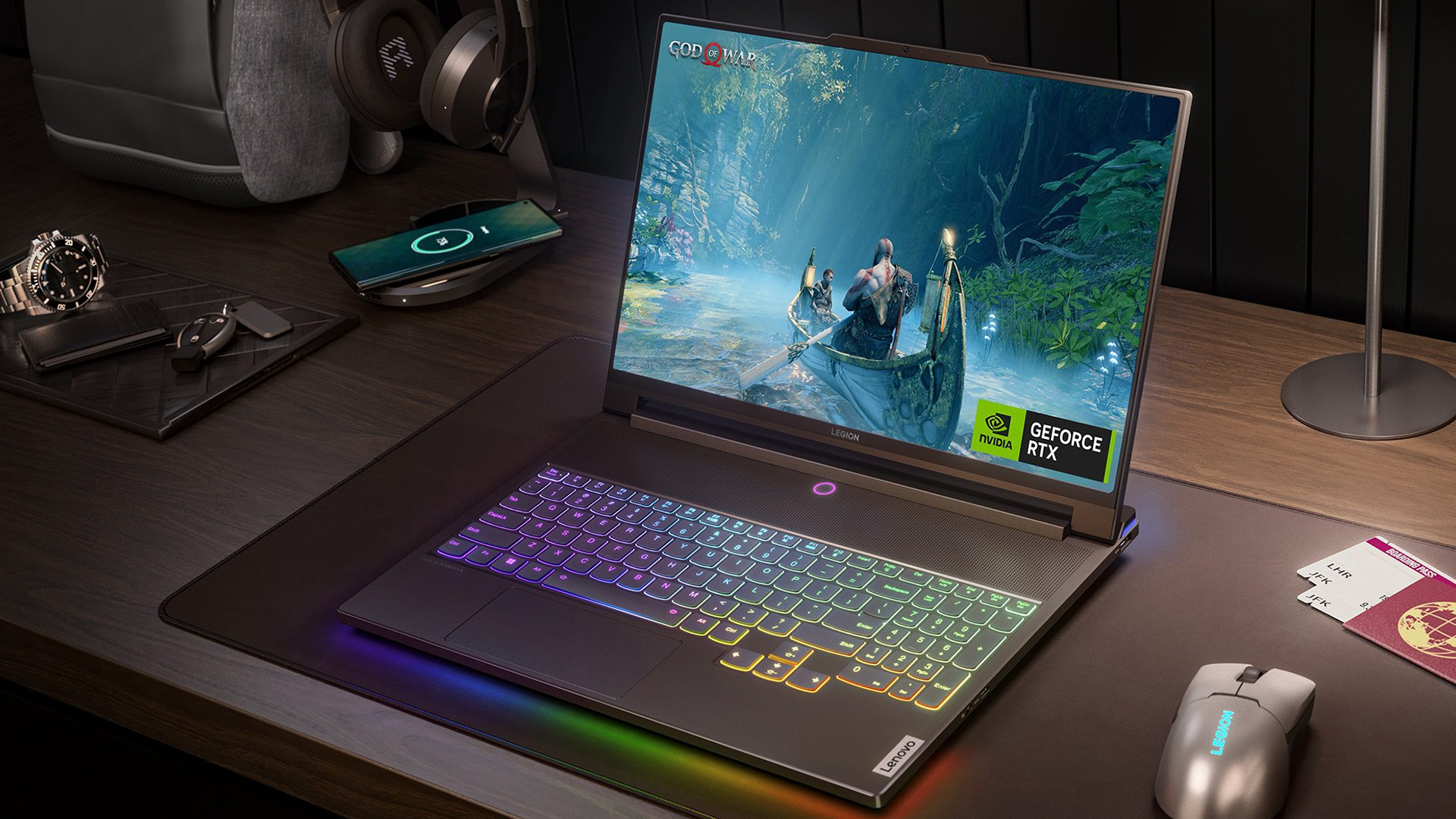 Lenovo Legion gaming laptop on a desk displaying God of War game.