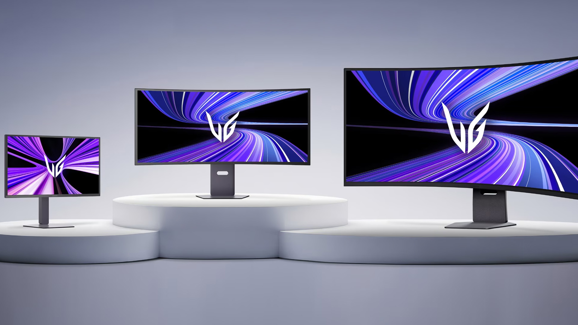 Lineup of three LG UltraGear gaming monitors displayed on white podiums.