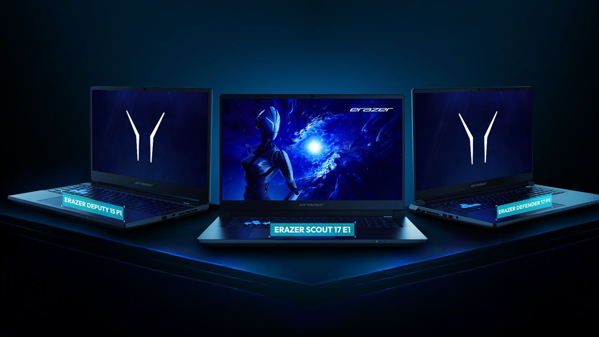 Lineup of Medion Erazer gaming laptops with blue backlit keyboards.