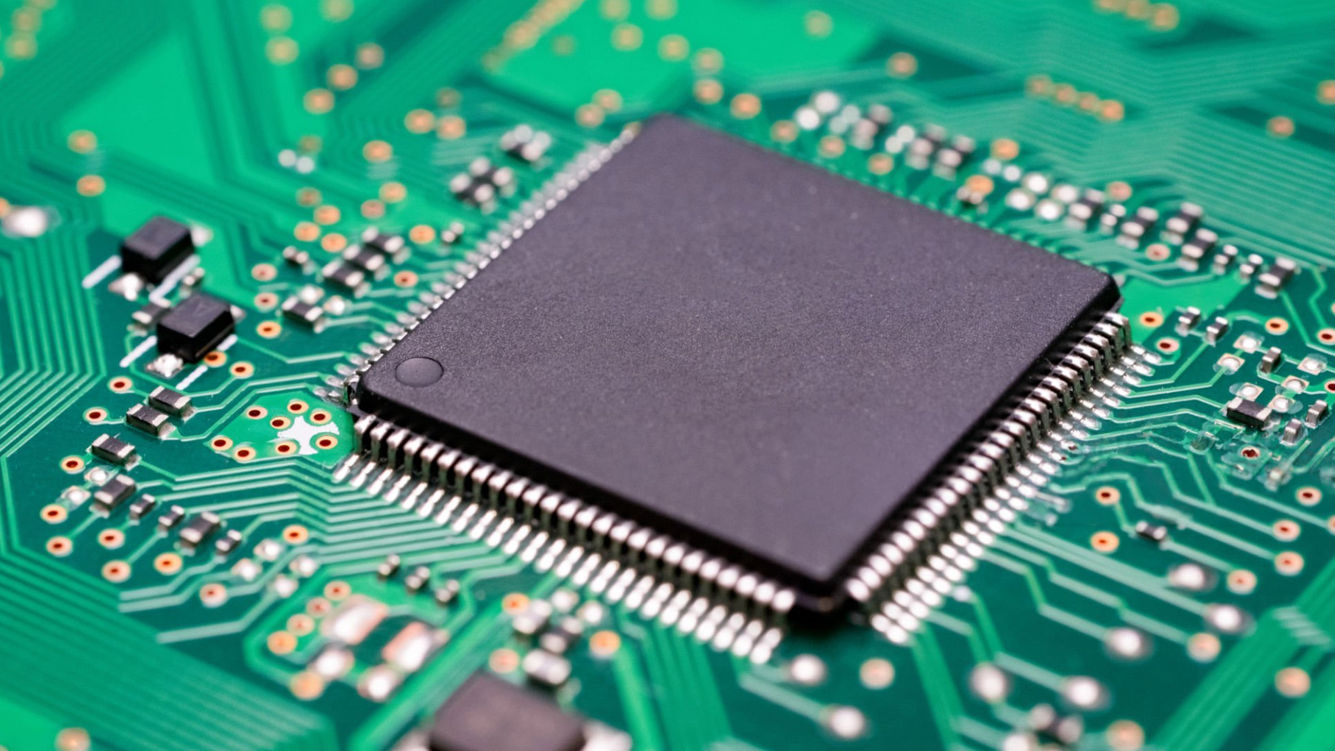 Close up view of a processor chip on a motherboard.