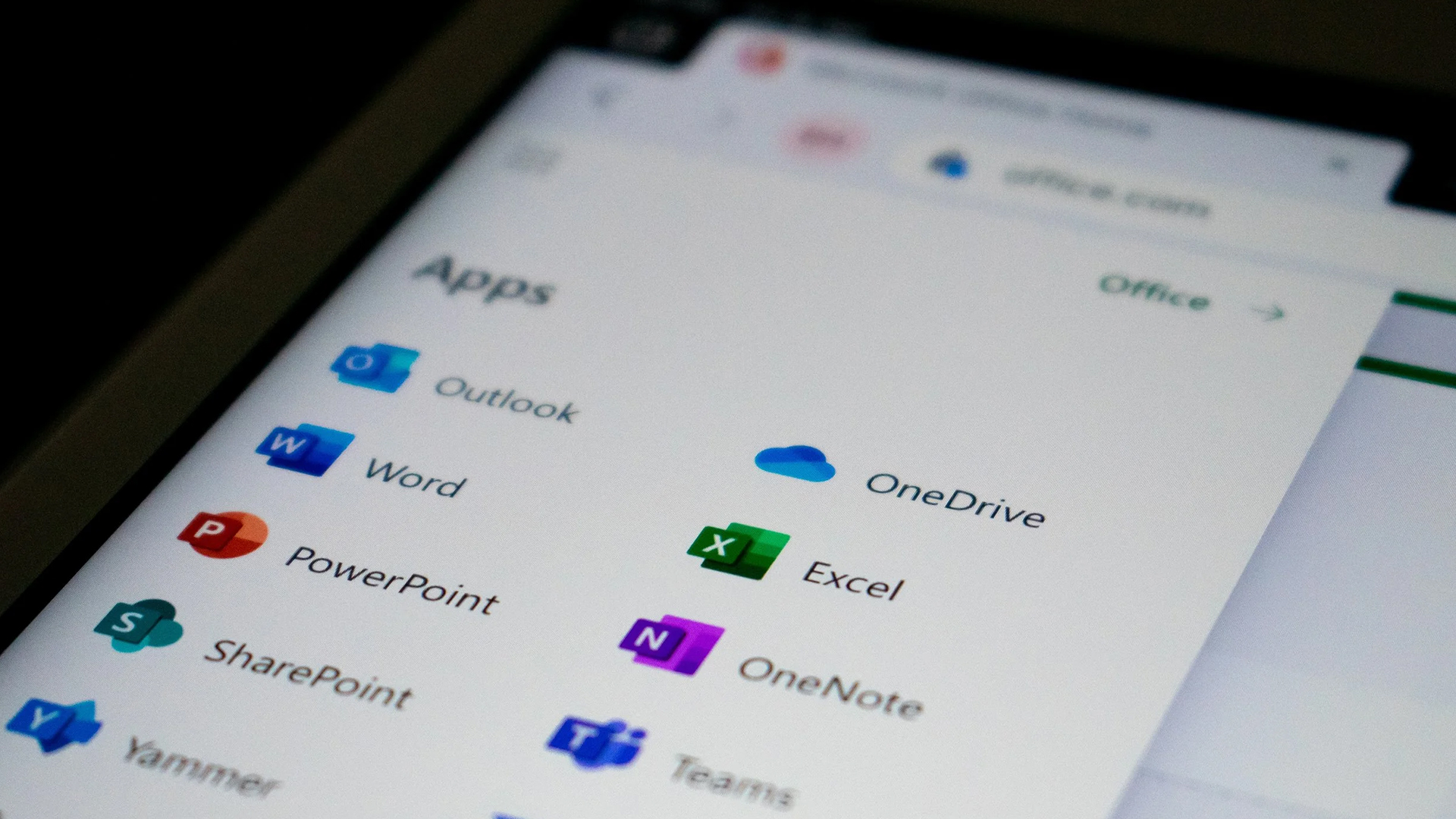 Microsoft 365 apps listed on a digital screen menu.