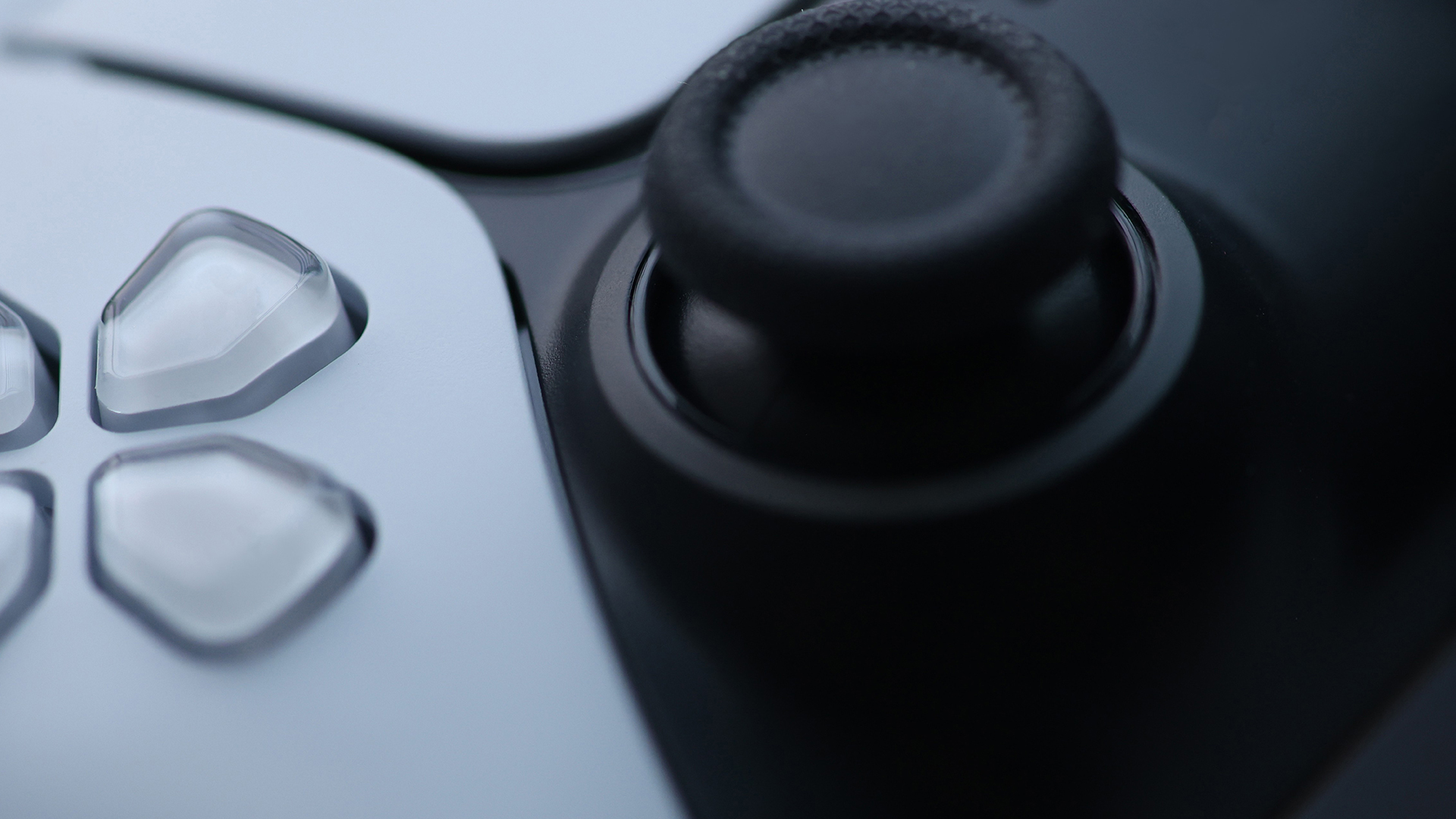Close-up detail of a PS5 DualSense controller thumbstick.