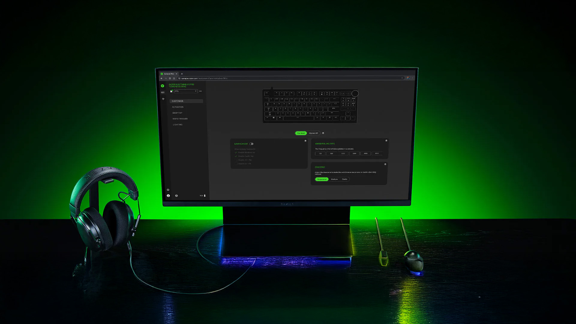 Monitor displaying Razer Synapse 4 software interface next to a gaming headset.