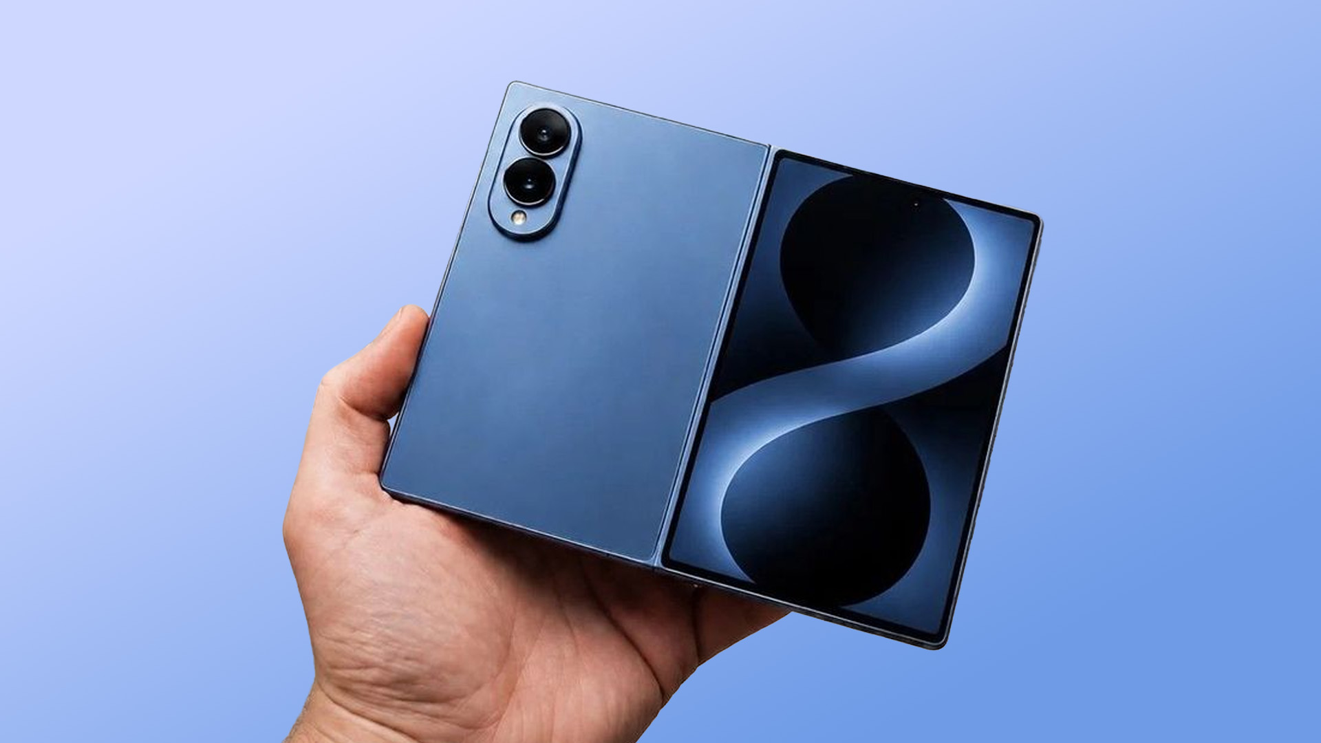 Hand holding a blue Samsung Galaxy Z Fold8 phone in an unfolded position.