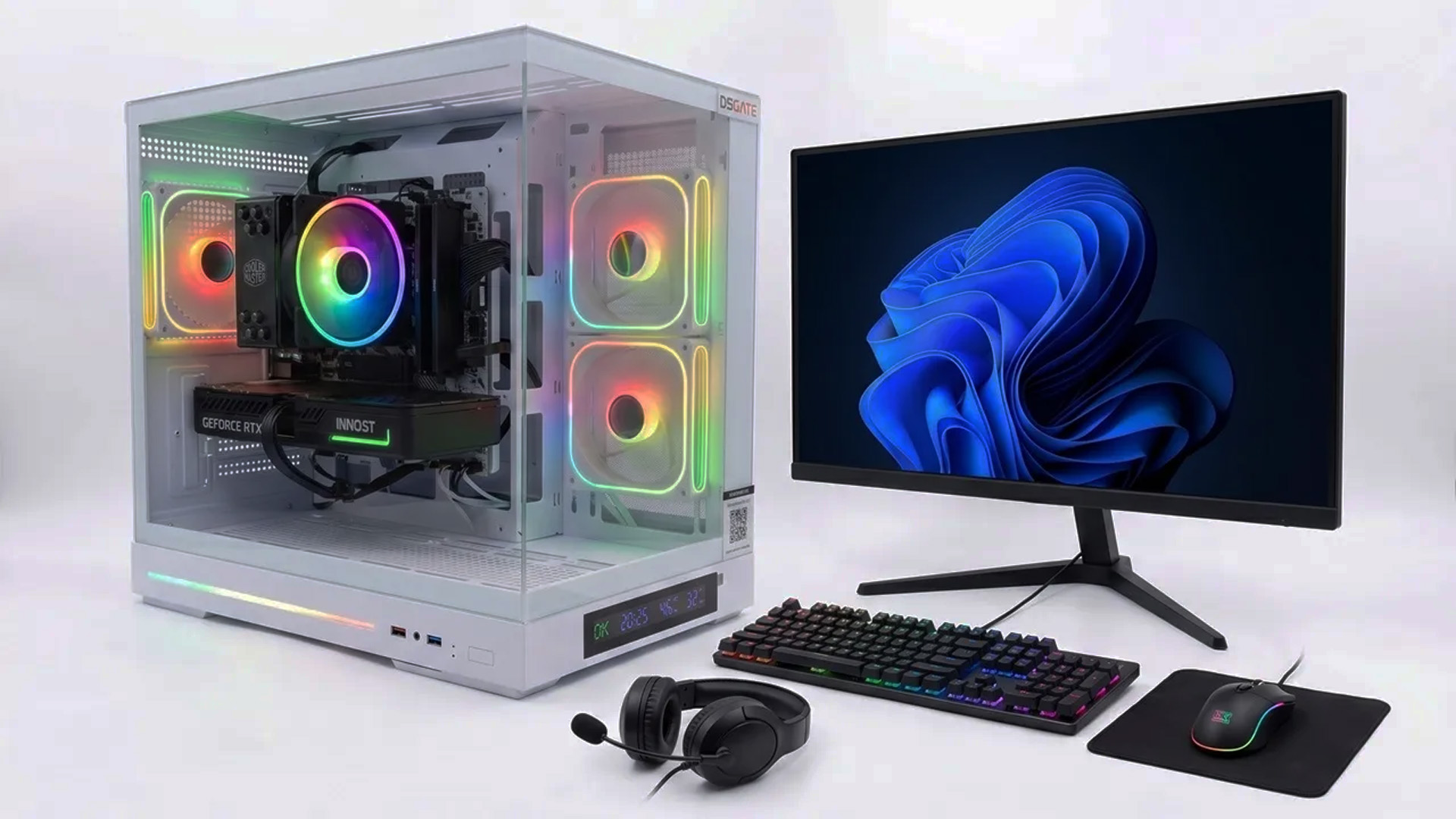 A white gaming PC tower featuring RGB fans and a monitor setup on a clean desk.